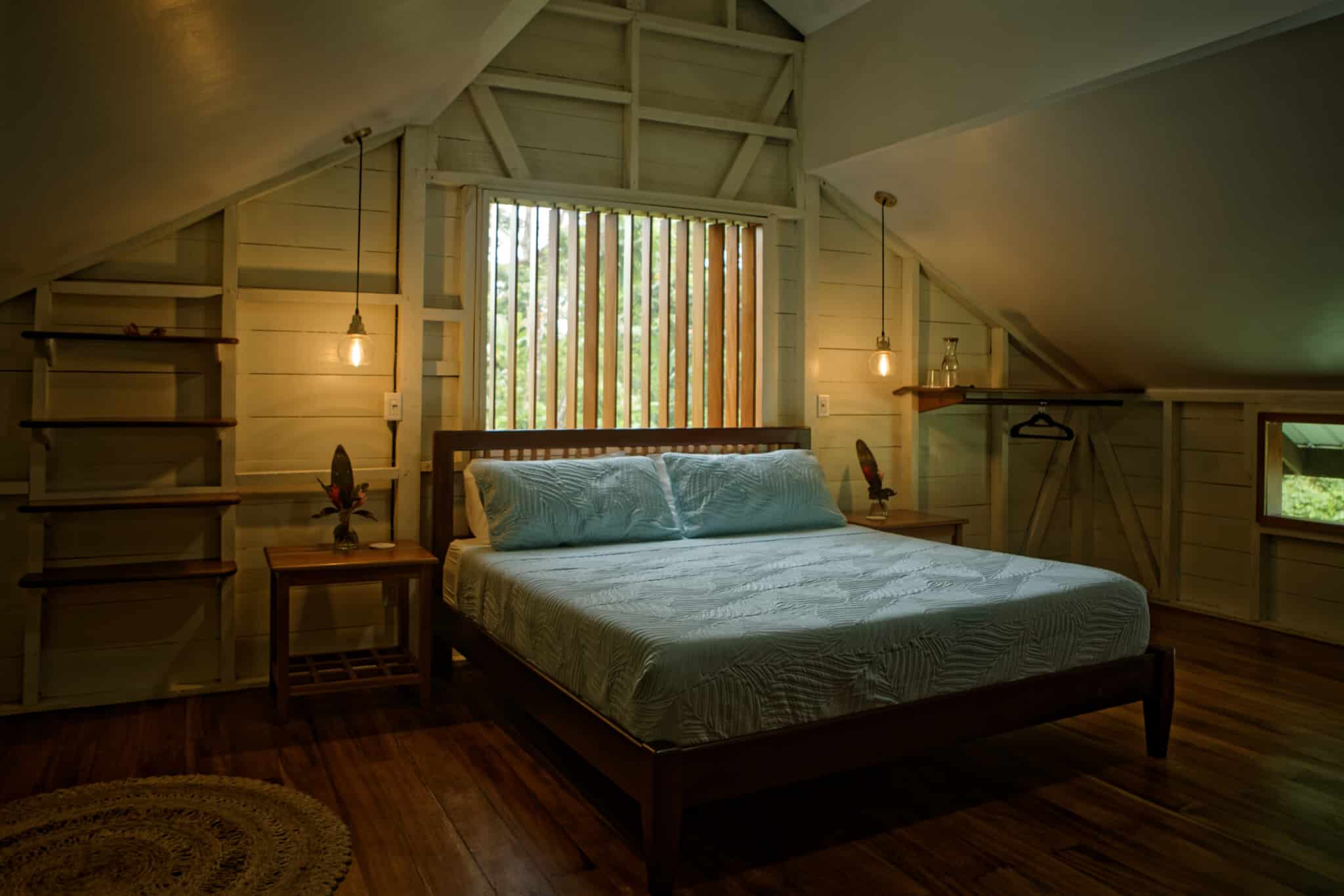 Two-story King suite with loft bed at The Lodge at Punta Rica