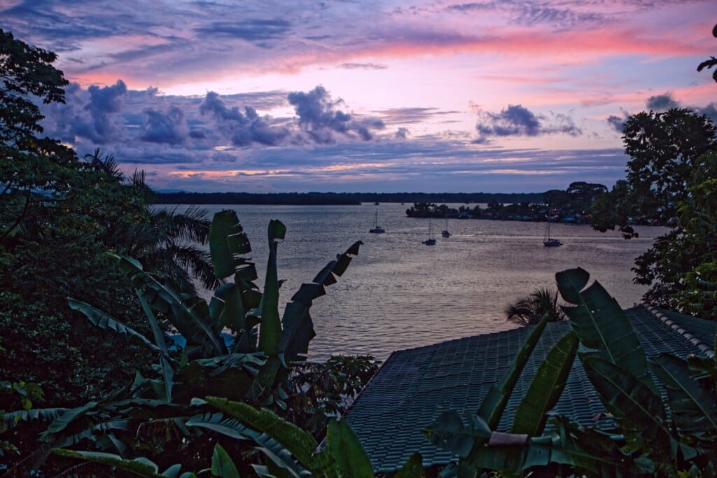 Sunset over the bay from the hillside at The Lodge at Punta Rica, Isla Bastimentos